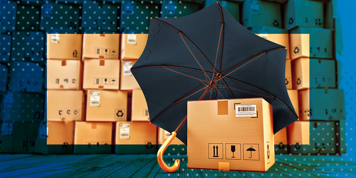 Cardboard shipping box resting underneath a black umbrella