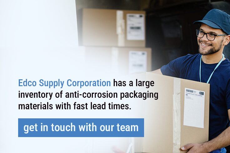 Man loading corrosion protected packaging